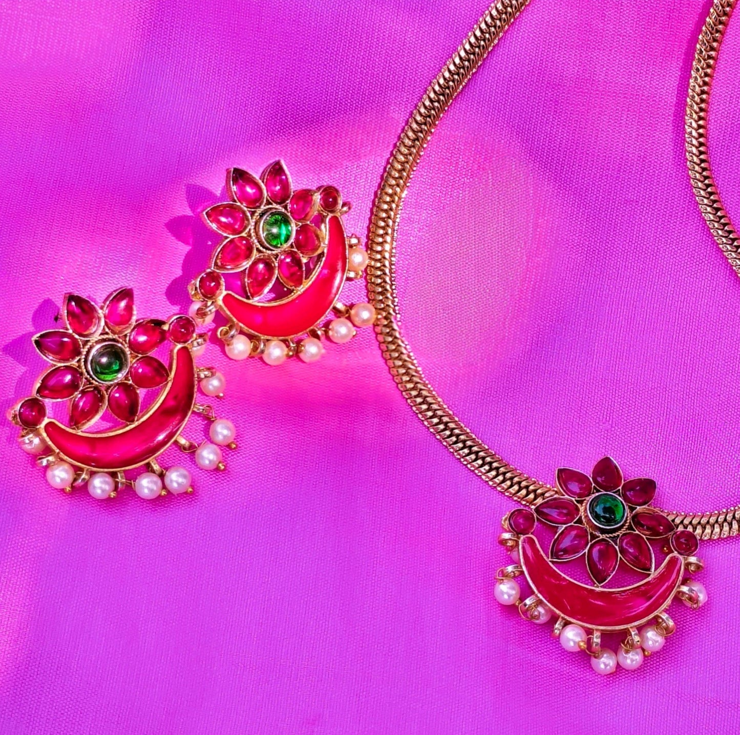 Embrace the vibrant allure of Indian heritage with this stunning Temple Jewelry Set