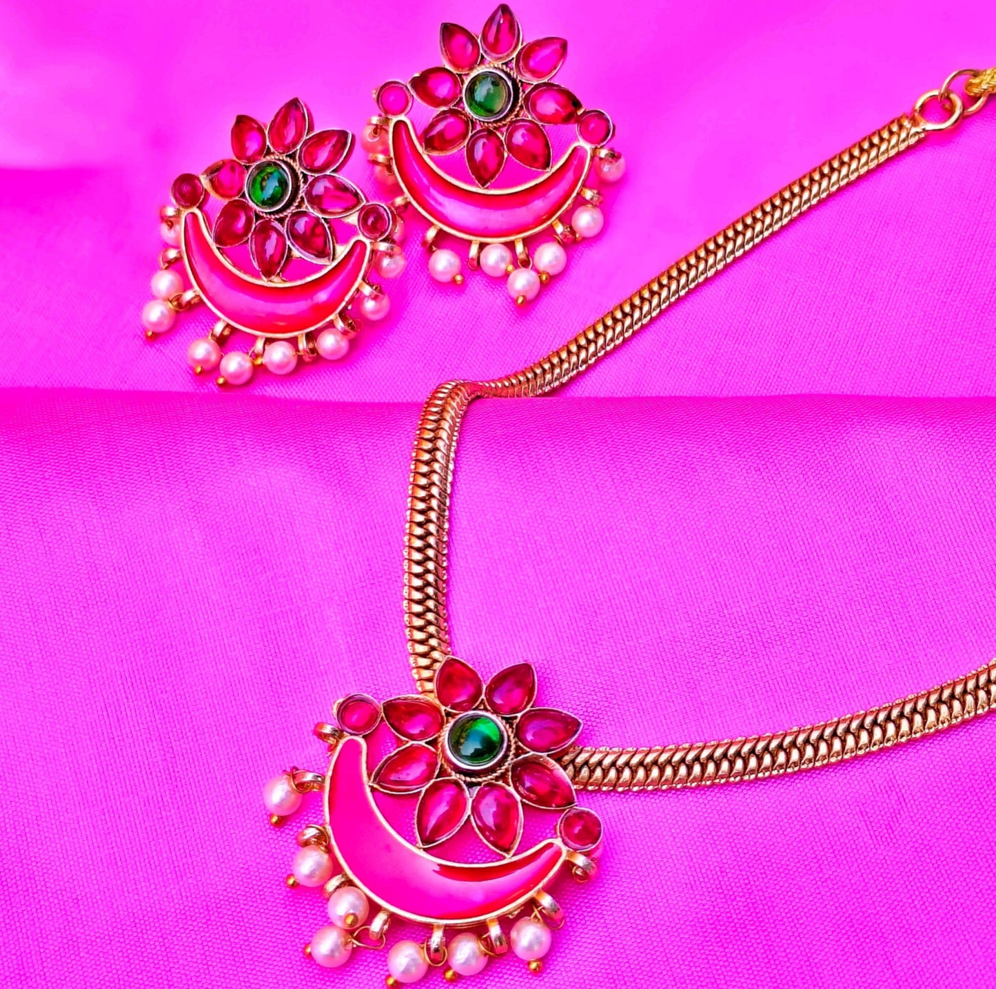 Embrace the vibrant allure of Indian heritage with this stunning Temple Jewelry Set
