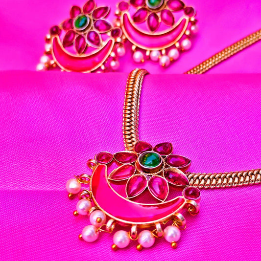 Embrace the vibrant allure of Indian heritage with this stunning Temple Jewelry Set